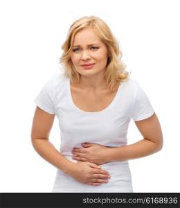 people, healthcare and problem concept - unhappy woman suffering from stomach ache