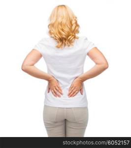 people, healthcare, backache and problem concept - woman suffering from pain in back or reins