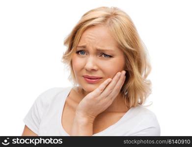 people, healthcare, dentistry and problem concept - unhappy woman suffering toothache