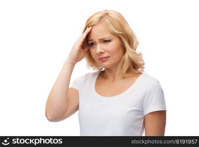 people, healthcare, stress and problem concept - unhappy woman suffering from headache