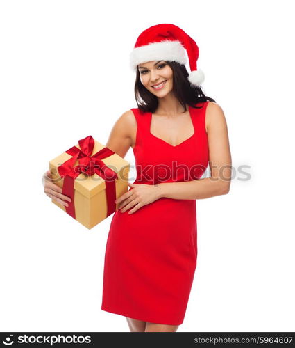 people, holidays, christmas and celebration concept - beautiful sexy woman in red dress and santa hat with gift box