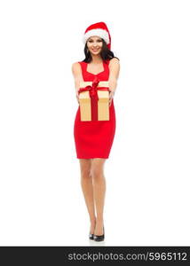 people, holidays, christmas and celebration concept - beautiful sexy woman in red dress and santa hat with gift box