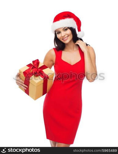 people, holidays, christmas and celebration concept - beautiful sexy woman in red dress and santa hat with gift box