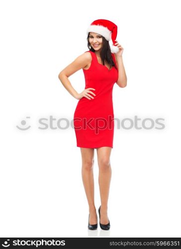 people, holidays, christmas and celebration concept - beautiful sexy woman in santa hat and red dress posing full-length