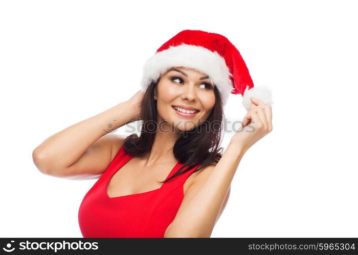 people, holidays, christmas and celebration concept - beautiful sexy woman in santa hat and red dress