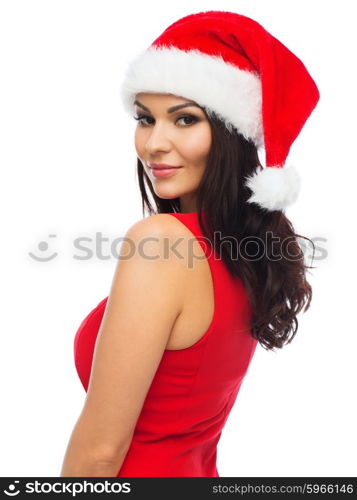 people, holidays, christmas and celebration concept - beautiful sexy woman in santa hat and red dress