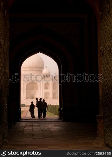 People in arch of Taj Mahal, Agra, India