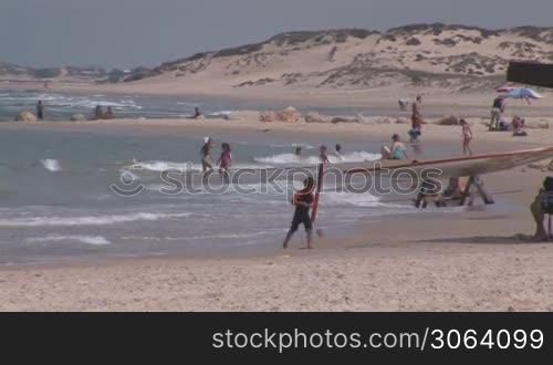 people in Caesarea beach, Israel