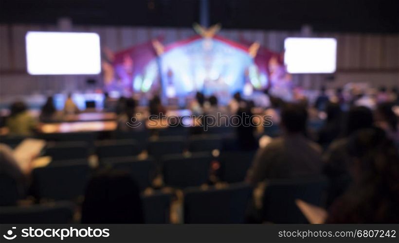 people in seminar conference exhibition hall - blur for use as background