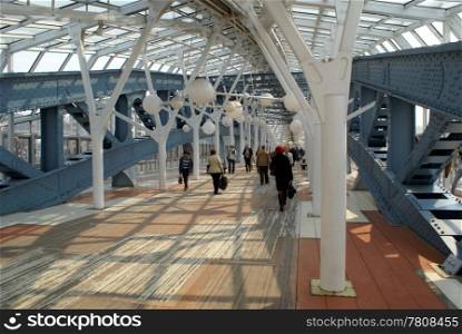 People inside iron bridge in Moscow, Russia