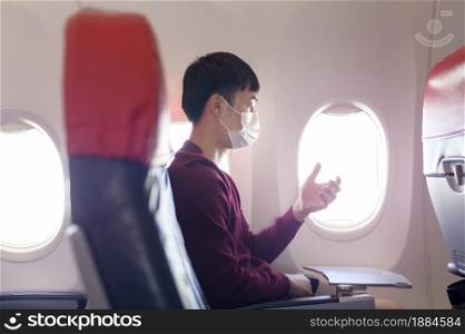 People is touching virtual screen in airplane , modern technology and transportation concept.