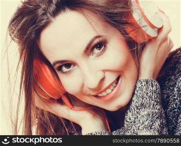 People leisure relax concept. Closeup woman casual style big headphones listening music mp3 relaxing
