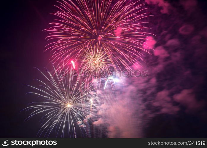 People looking at fireworks in honor of Independence Day. Fireworks on Independence day in USA