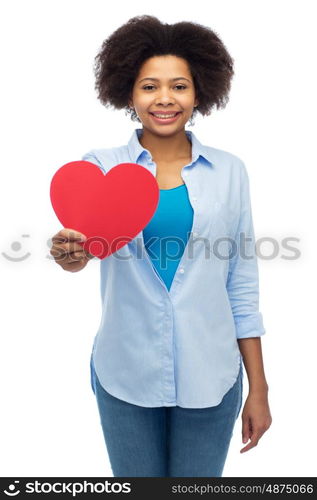 people, love, valentines day and health concept - happy african american young woman with red heart shape over white