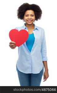 people, love, valentines day and health concept - happy african american young woman with red heart shape over white