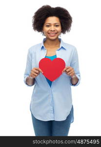 people, love, valentines day and health concept - happy african american young woman with red heart shape over white