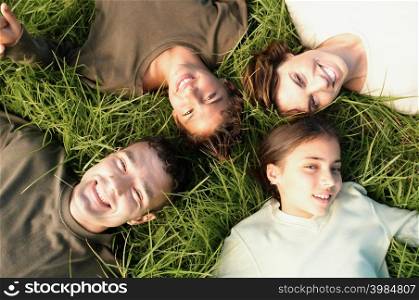 People lying on grass