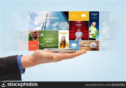 people, mass media, technology and business concept - close up of male hand with smartphone and news web page projection