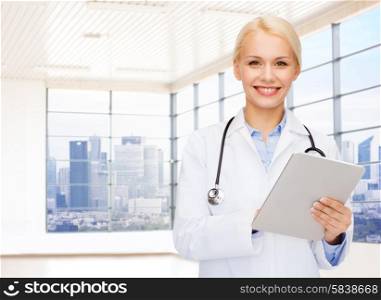 people, medicine and profession concept - smiling young female doctor with tablet pc computer and stethoscope over clinic background