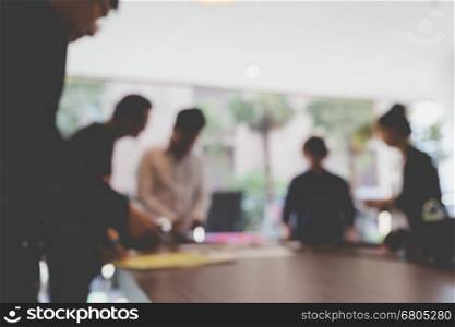 people meeting and working in office workplace - blur background