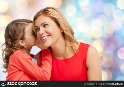 people, motherhood, family and adoption concept - happy mother and daughter whispering something into ear over blue holidays lights background