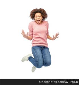 people, motion and action concept - happy african american young woman jumping over white