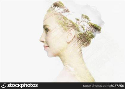 people, nature and beauty concept - beautiful young woman face with natural double exposure effect over white background. beautiful young woman face over natural background