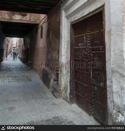 People on a narrow street, Medina, Marrakesh, Morocco