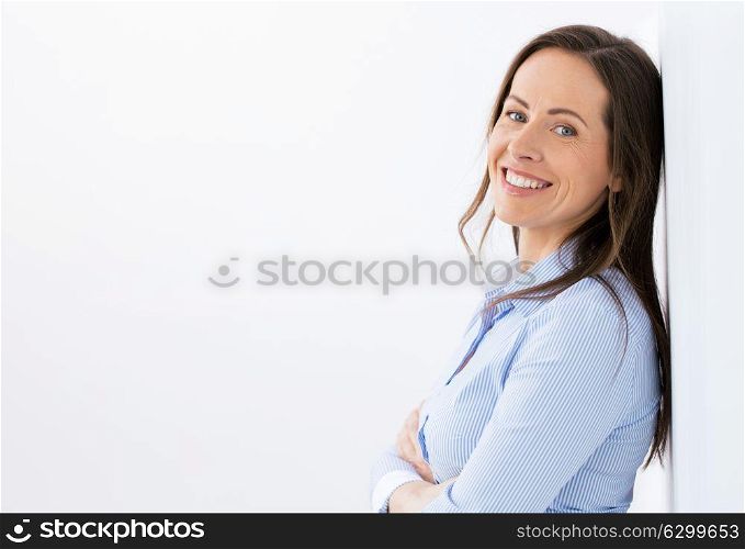 people, portrait and business concept - face of happy smiling middle aged woman or office worker. face of happy smiling middle aged woman