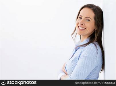 people, portrait and business concept - face of happy smiling middle aged woman or office worker. face of happy smiling middle aged woman
