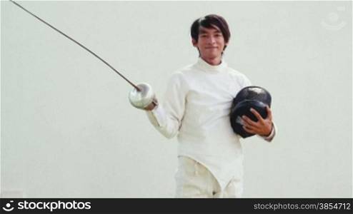 People practicing, training, man, athletes, sport, fencing duel. Olympic sports. Portrait of athlete looking at camera, smiling. 24of26