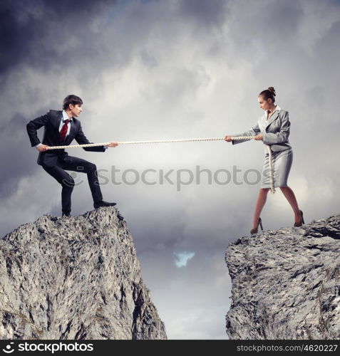 People pull the rope.. Confrontation between two business people. Abstract collage .