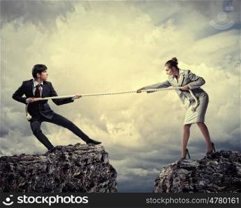 People pull the rope.. Confrontation between two business people. Abstract collage .