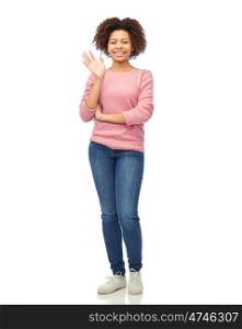 people, race, ethnicity and gesture concept - happy african american young woman waving hand over white