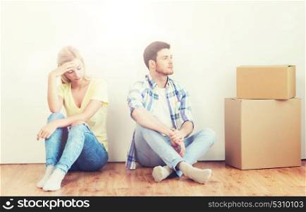 people, relationship difficulties, divorce, conflict and family concept - unhappy couple having argument or break up at home. unhappy couple having argument at home