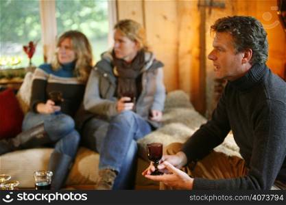 People relaxing in a converted barn