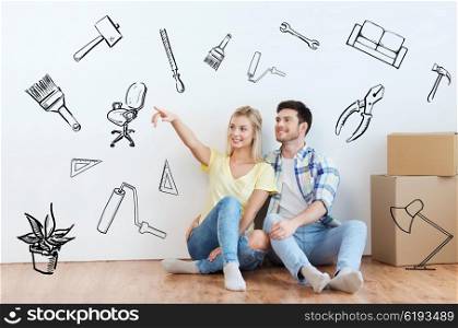 people, repair and real estate concept - smiling couple with boxes moving to new home and dreaming over doodles