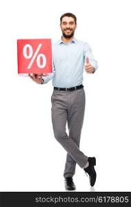 people, sale, shopping, discount and holidays concept - smiling man holding red percentage sign