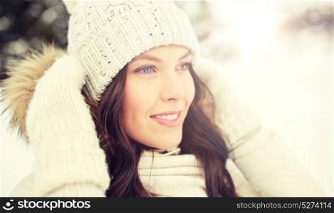 people, season and leisure concept - happy woman outdoors in winter. happy woman outdoors in winter