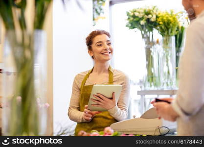 people, shopping, sale, floristry and consumerism concept - happy smiling florist woman with tablet pc computer and man with wallet at flower shop