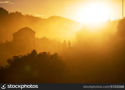 People silhouette in villahe at Titicaca lake. Bolivia