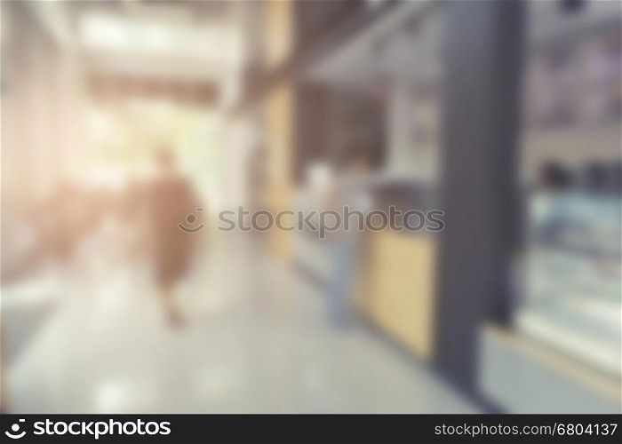 people sitting in cafe coffee shop for background, vintage tone and defocused