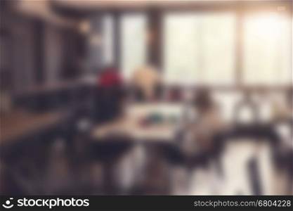 people sitting in cafe coffee shop restaurant for background, blur and defocused