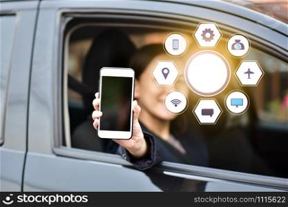 People sitting in car using mobile smart phone application social media network in car,Mobile technology cell phone smart life app icon