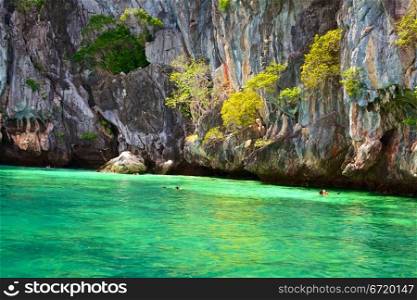 people snorkeling near Marakot Cave, Andaman Sea, Thailand