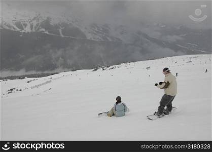 People snowboarding