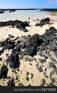 people spain hill yellow beach spiral of black rocks in the lanzarote &#xA;