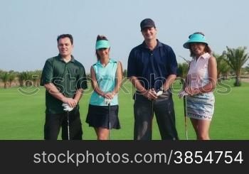 People, sport, leisure activity, recreation and lifestyle, golf in country club during summer holidays. Portrait of players in golf course, looking at camera. Friends, women and men. 7of30