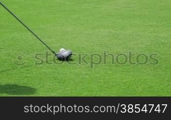 People, sport, leisure activity, recreation and lifestyle, man hitting ball with club in golf course. 26of30