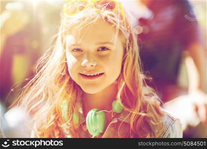 people, summer and portrait concept - happy teenage girl with headphones. happy teenage girl with headphones. happy teenage girl with headphones